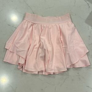 Women’s Lululemon court rival high rise/tall skirt pink size 4